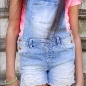 Denim short overalls with embroidered trim